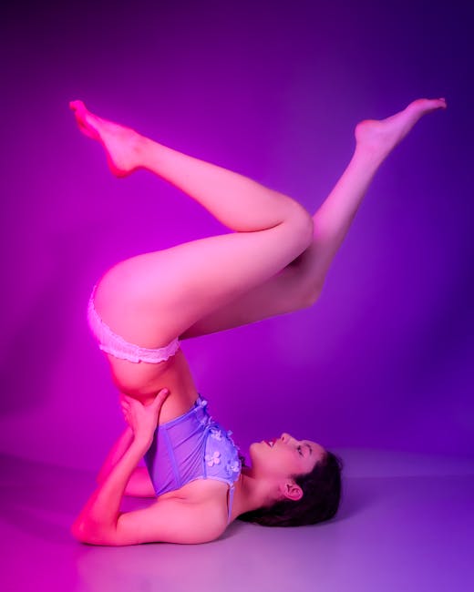 Person demonstrating graceful strength in a dynamic yoga pose