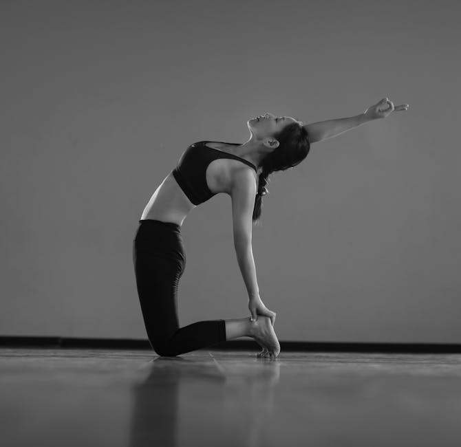 Woman deeply engaged in a mindful yoga flow pose in a sunlit, peaceful room